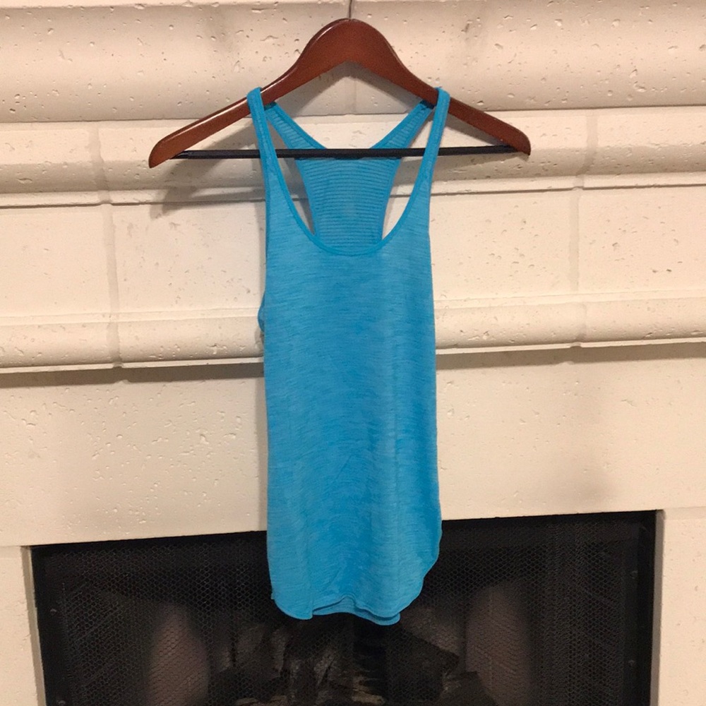 Lululemon yoga tank with babydoll features.